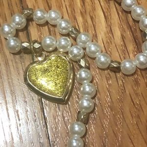 gold, sparkly, white plastic pearl locket